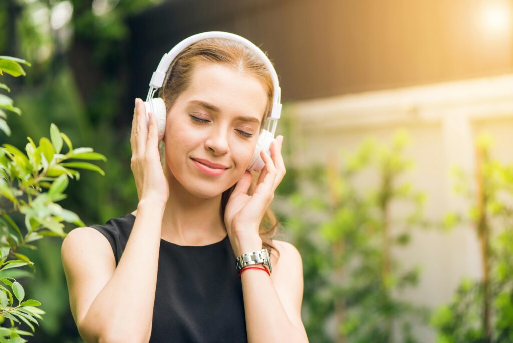 Happy Woman hearing Music